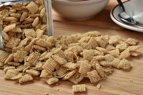 Rice squares spilling out of canister