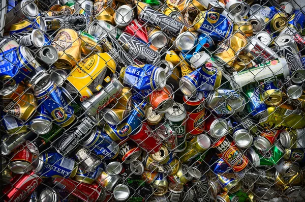 Different cans for recycling into a container