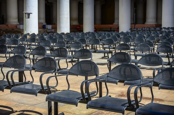 Rows of empty chairs