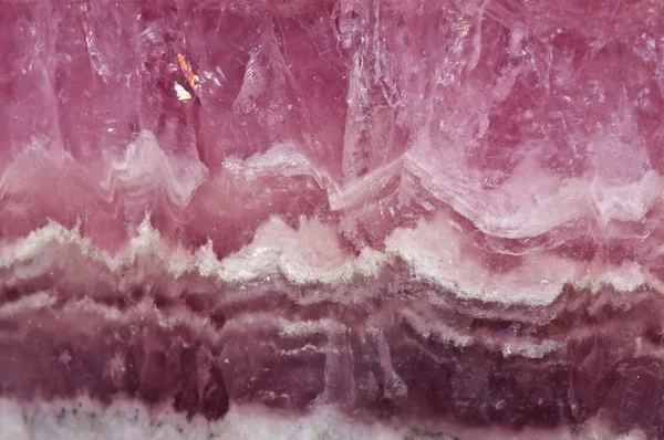 Pink manganese carbonate mineral. Macro