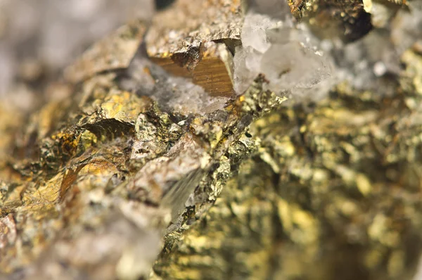 Golden pyrite chemical formula FeS2. Macro