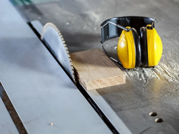 Circular saw in carpentry workshop