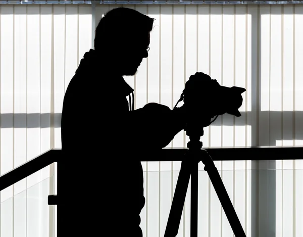 Silhouette of video and photographic equipment