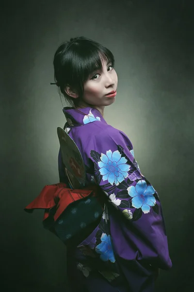 Beautiful japanese woman in traditional kimono