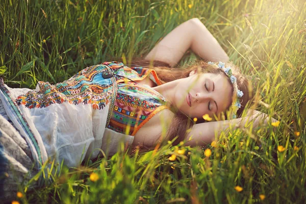 Beautiful hippie woman peacefully sleep