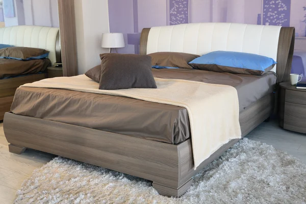 Stylish cream and brown bed