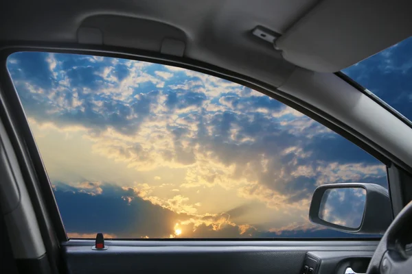 Landscape behind  car window