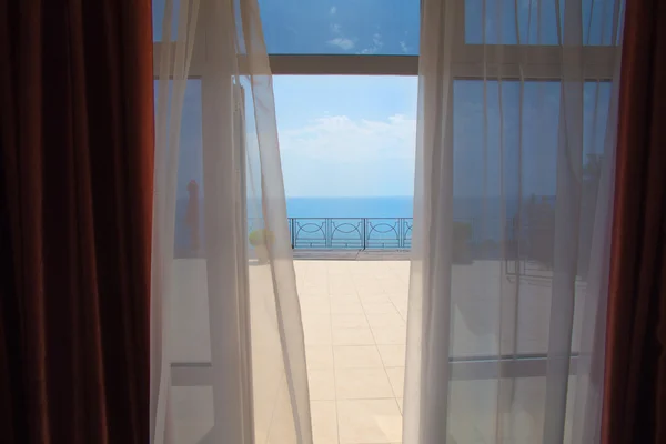 View of the sea from a hotel room