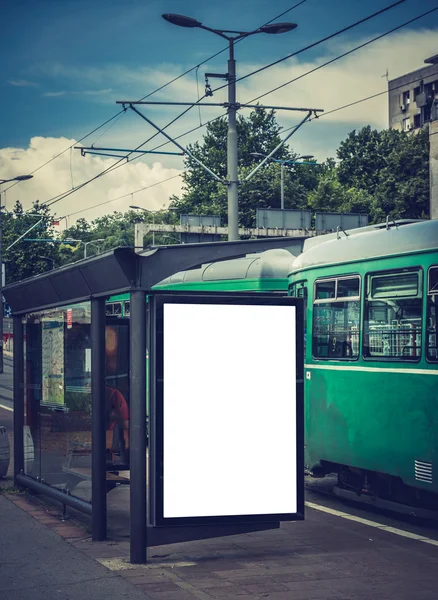 Blank billboard on tram station
