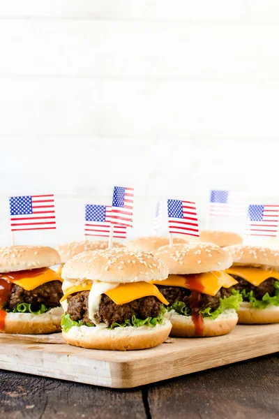 Mini beef burgers with American flags