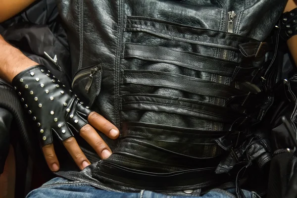 Hands in leather gloves