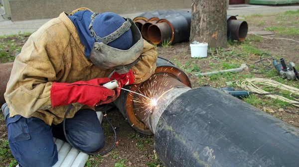 Welder With Leather Welding Protective Clothing