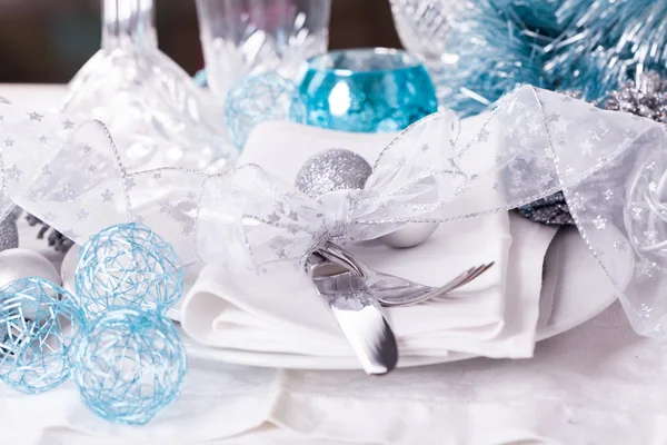 Blue and silver Christmas table setting