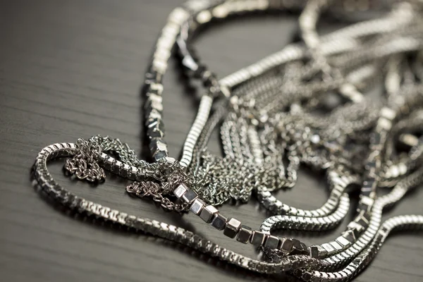Pile of assorted silver chains
