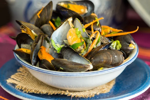 Single Serving of Mussels in Bowl on Table