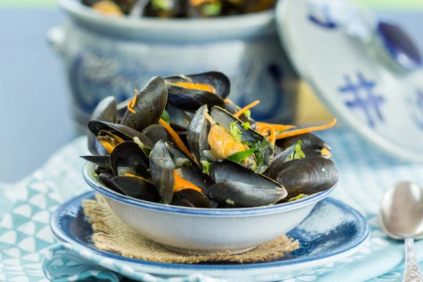 Single Serving of Mussels in Bowl on Table