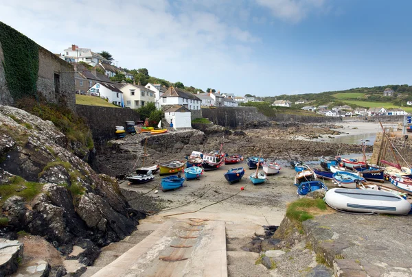 Summer and low tide Coverack harbour Cornwall England UK coastal fishing village on the Lizard Heritage coast South West England