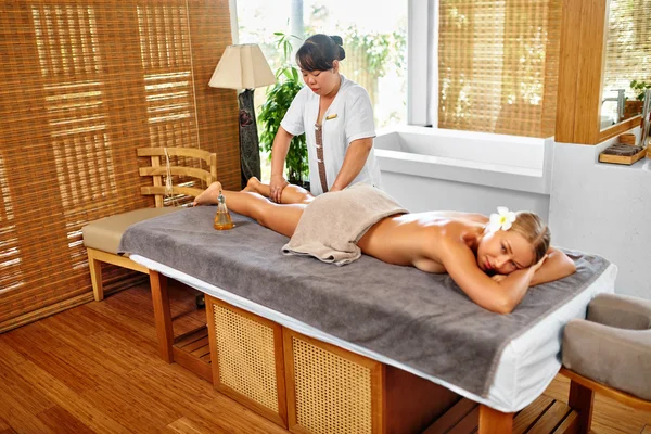 Leg Massage Spa Therapy. Body Care. Masseur Massaging Female Leg