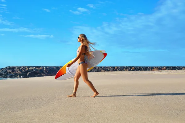 Healthy Lifestyle. Surfing. Water Sports. Woman With Surfboard.