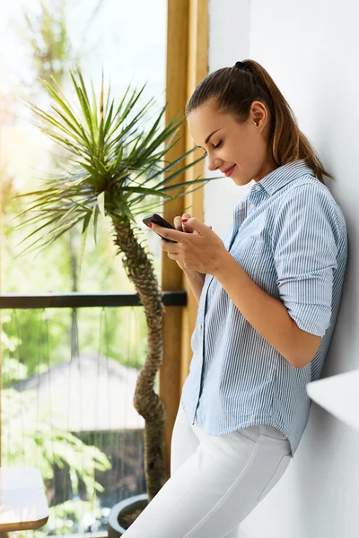 Communication Technology. Business Woman Using Mobile Phone