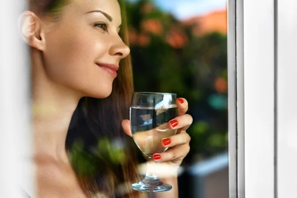 Drink Water. Smiling Woman Drinking Water. Diet. Healthy Lifestyle