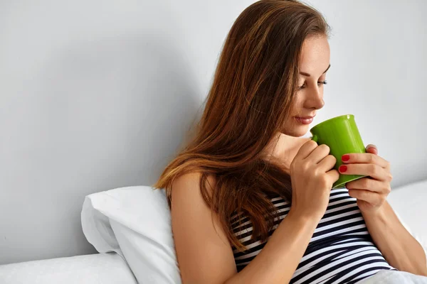 Drink Morning Tea. Woman Drinking Beverage In Bed. Healthy Lifestyle