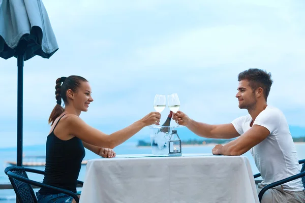 Romantic Couple In Love Having Dinner At Sea Beach Restaurant