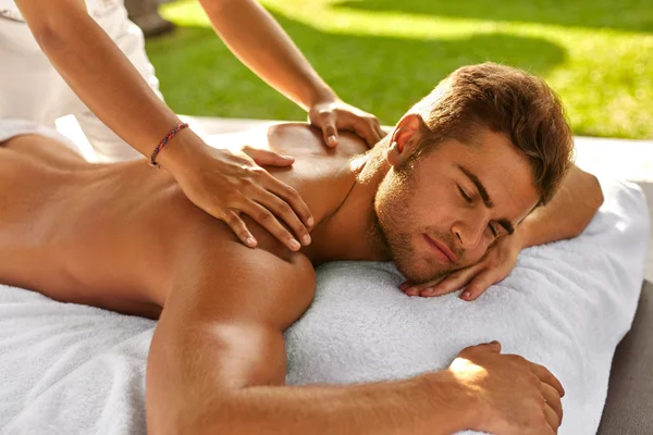 Spa Massage For Man. Male Enjoying Relaxing Back Massage Outdoor