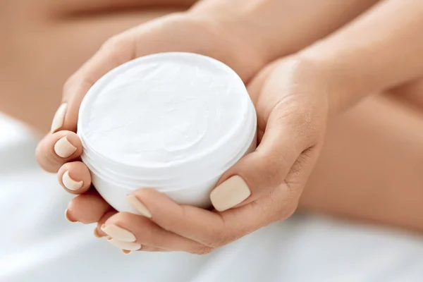 Skin Care Product. Woman's Hands Holding Beauty Cream, Lotion.