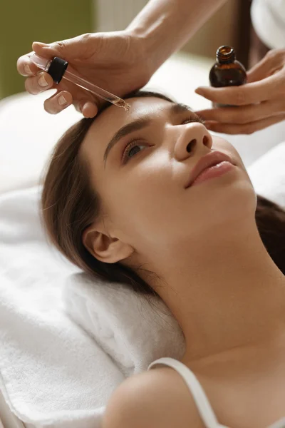 Face Skin Care. Woman Receiving Serum Treatment In Beauty Salon