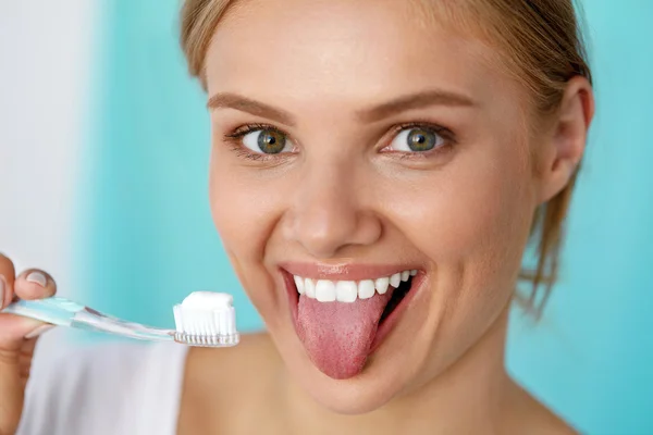 Woman With Beautiful Smile, Healthy White Teeth With Toothbrush