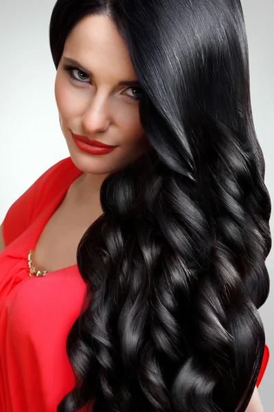 Beautiful Woman with Black Wavy Hair.