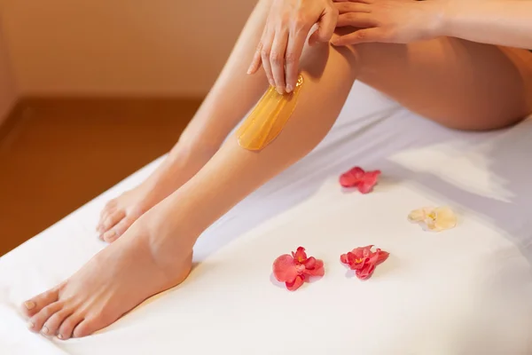 Long Woman Legs. Woman Cares About Her Legs. Sugaring Treatment