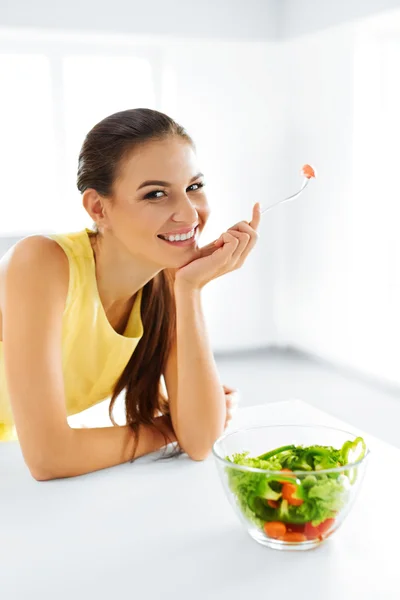 Healthy Eating. Vegetarian Woman Eating Salad. Food, Lifestyle, Diet Concept.