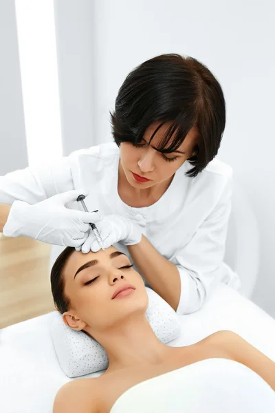 Plastic Surgery. Woman Gets Cosmetic Injection. Cosmetology. Bea