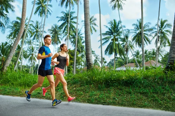 Sports. Runner Couple Running, Jogging On Road. Fitness, Healthy