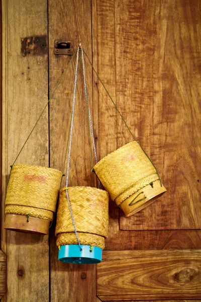 Bamboo container for holding cooked glutinous rice