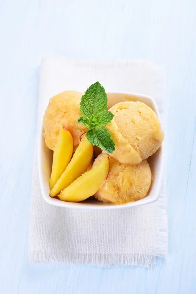 Peach ice cream with slices