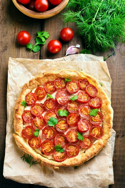 Tomato pie on baking paper