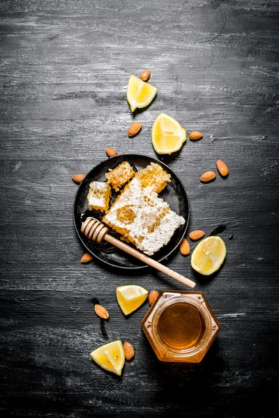 Honey background. Sweet natural honey with lemon .