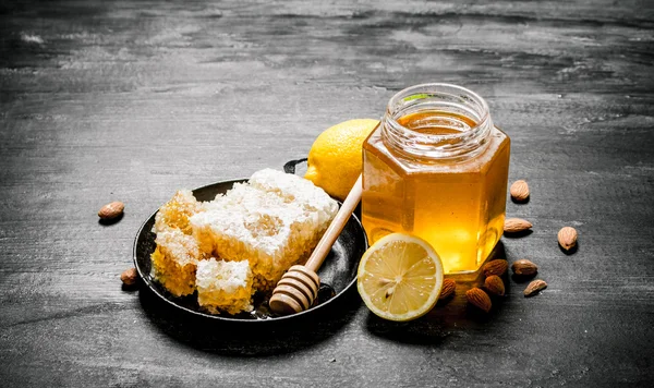 Honey background style. Fresh sweet honey with lemon.