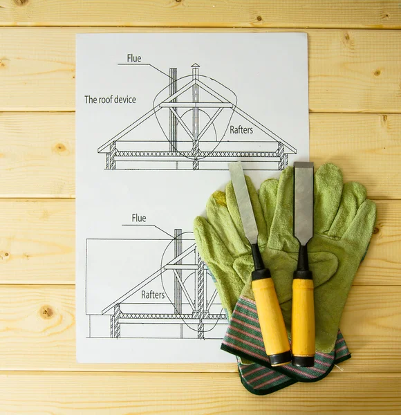 Repair work. Drawings for building and working tools on wooden background.