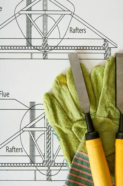 Repair work. Drawings for building and working tools on wooden background.