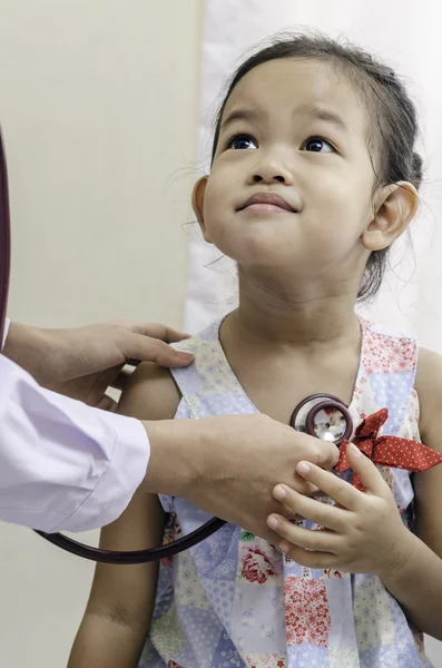 Pediatrician and a child