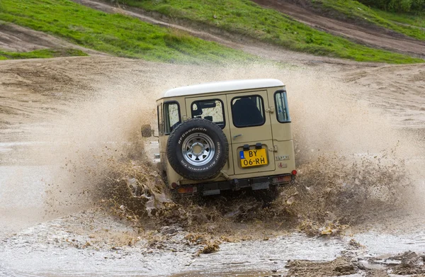 Four wheel drive on muddy track