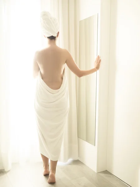 Beautiful young woman in towel