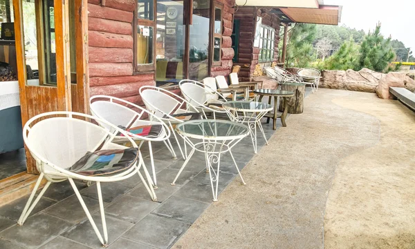 Tables and chairs in small shop