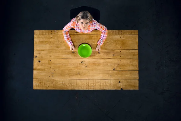 Top view of girl at table