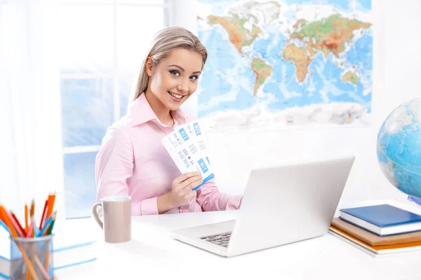Female travel agent at office