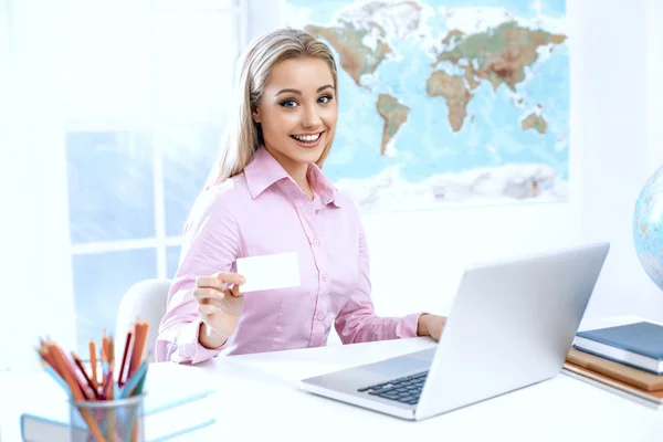 Female travel agent at office